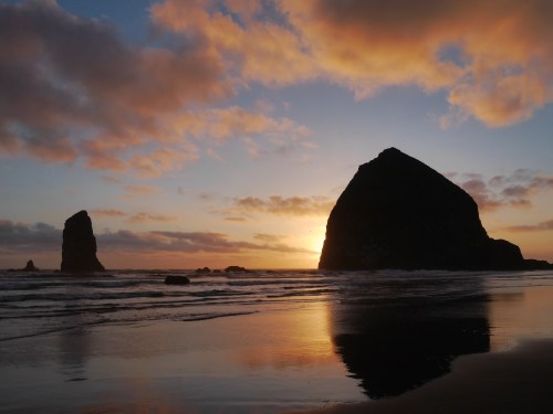 Haystack Rock and Needles at sunset