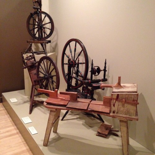 spinning wheels and carding bench