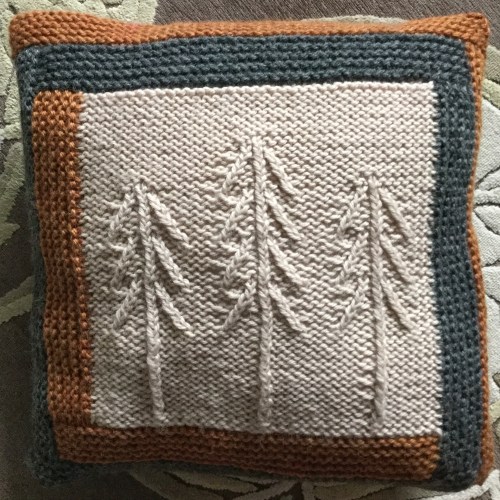 snowy woods log cabin firs