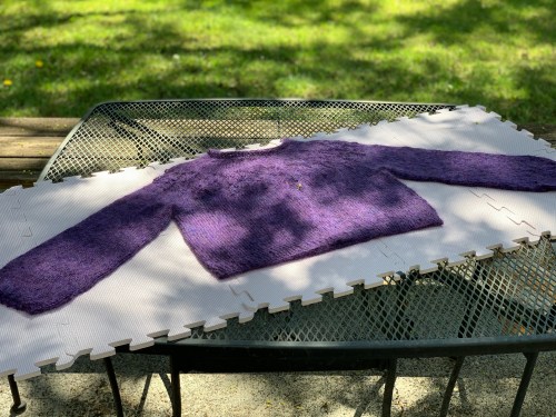 Love note sweater blocking outdoors