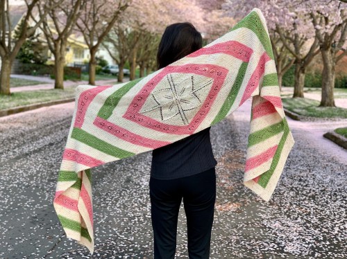 Cherry Blossom Wrapture shawl featuring log cabin knitting