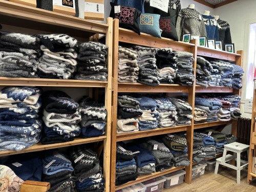 sweaters on shelves